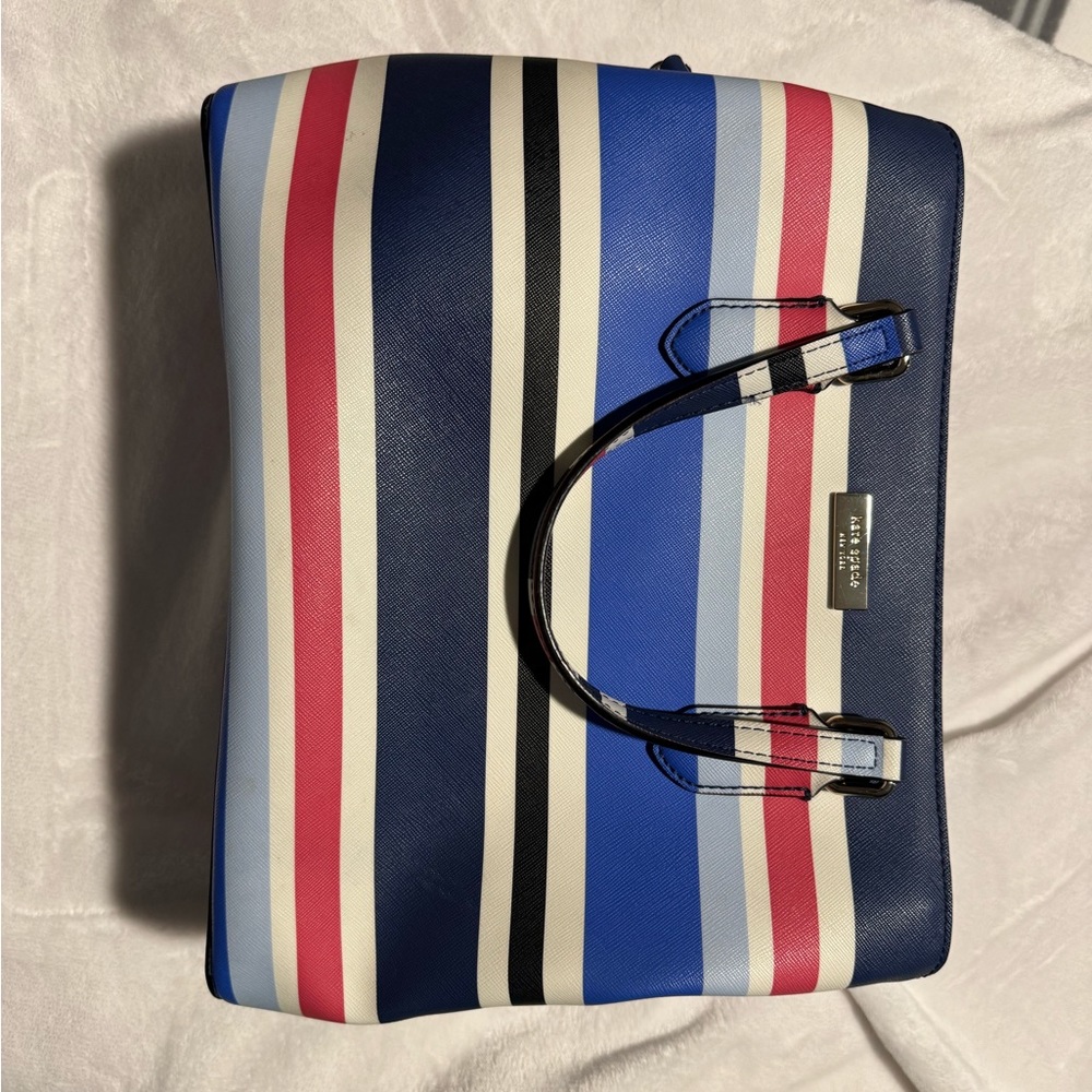Kate Spade large bag - almost new used 3-4 times with crossbody option as well.